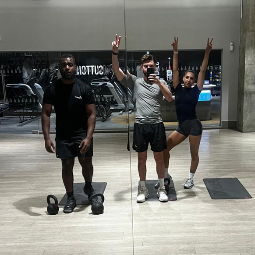 healthshift team celebrating after a workout session at the gym